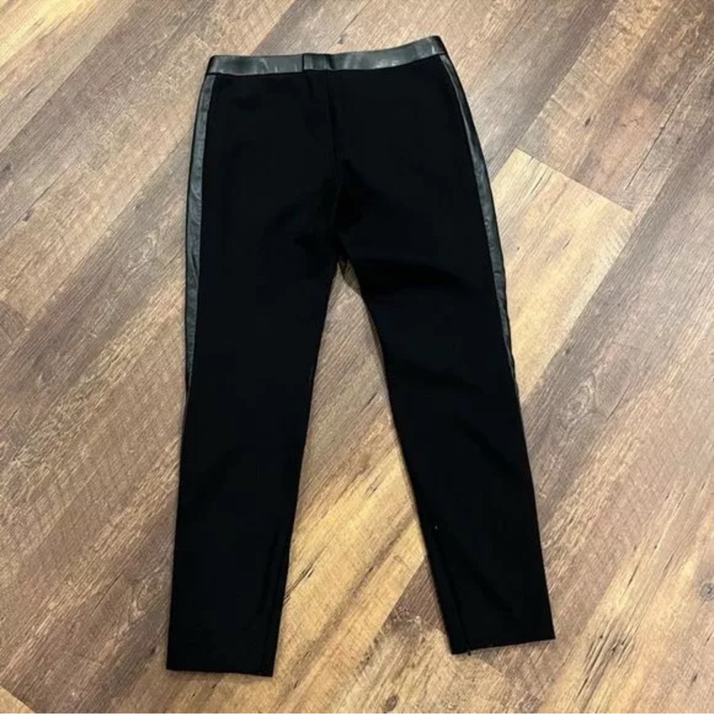 NWT TORY BURCH LEATHER BLACK ON BLACK SKINNY PANTS . SIZE SMALL .